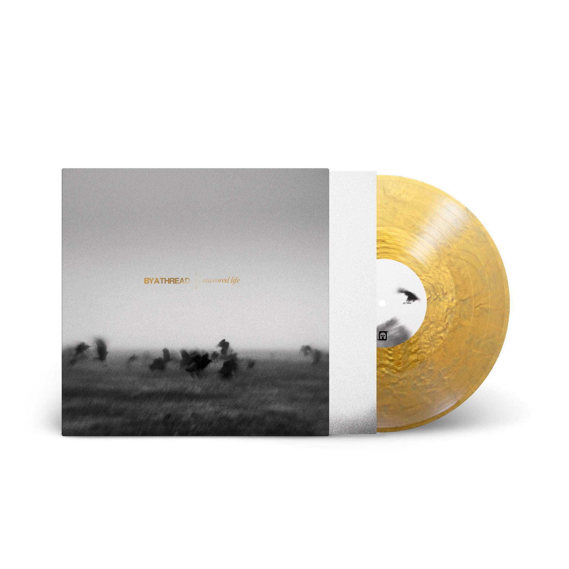 By A Thread - Mirrored Life – Spartan Records